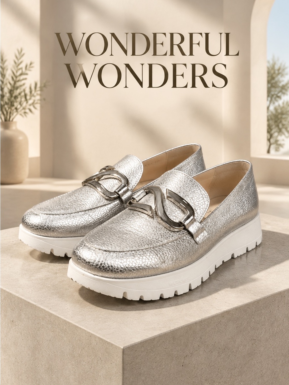 Wonders Women's Metallic Silver Slip-On Loafers with Chain Accent